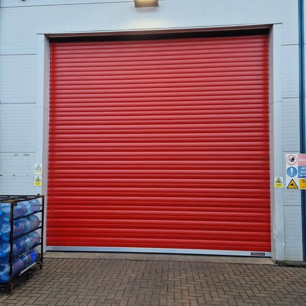 Red storefront with a matching rolling security gate