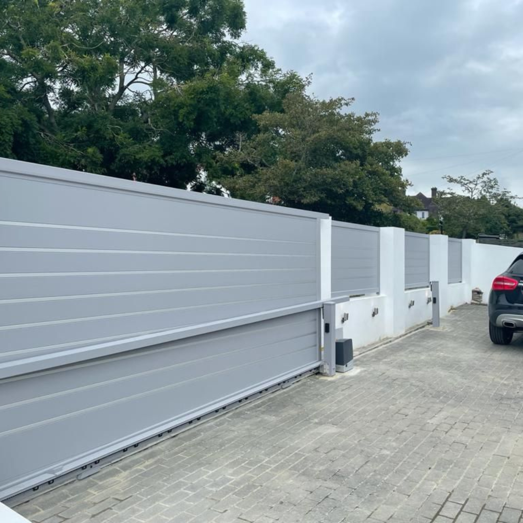 Gray electric sliding gate with modern metal design for residential and commercial